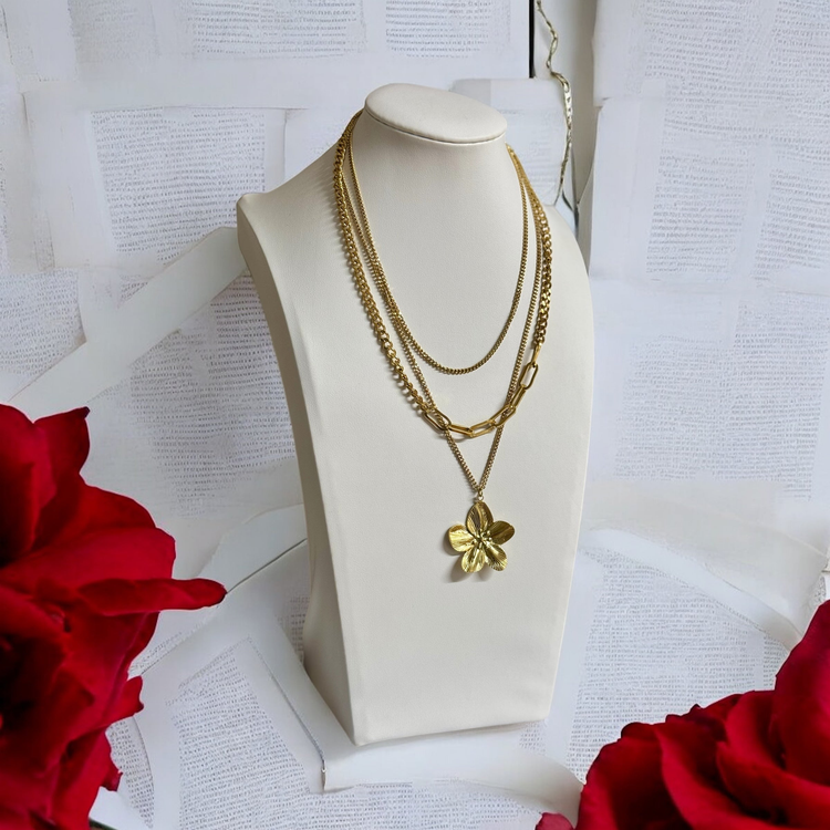 Gold layered waterproof necklace with chunky chains and floral pendant, displayed with red roses – 18k gold-plated stainless steel jewellery