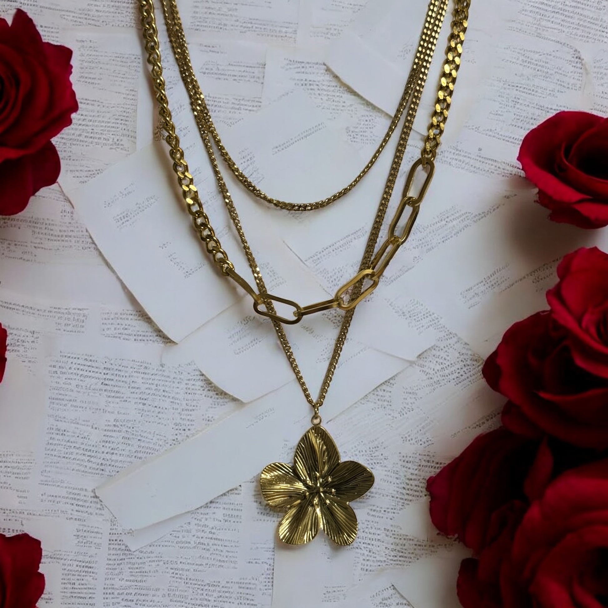 Gold Layered Necklace with gold hibiscus pendant.  Waterproof Necklace in 18k Gold Plated Stainless Steel.
