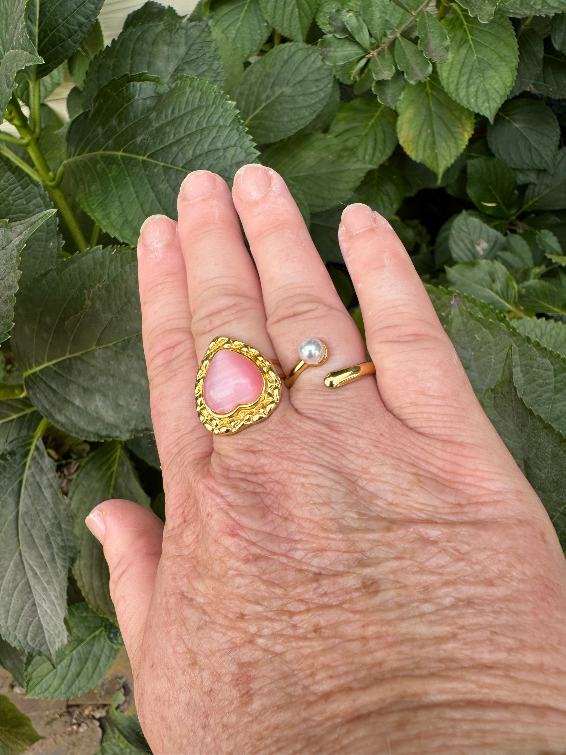 pink rhinestone heart ring 18k gold plated waterproof ring on woman's finger