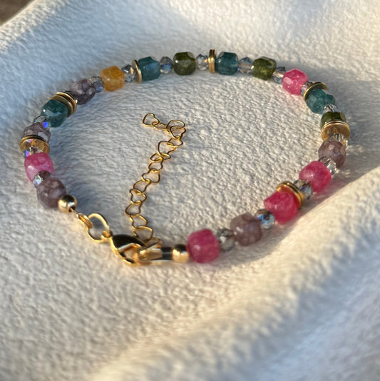 Handmade Tourmaline Bracelet Beautiful multiple Colours Pink, Purple, Orange, Green and blue with gold accents and lobster clasp.