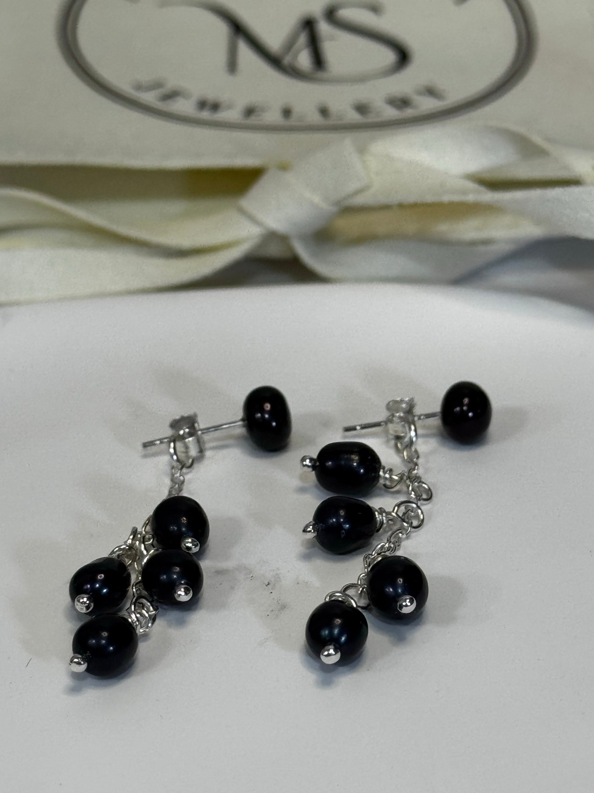 Black Pearl studs with dangling pearl earjacket. Black pearls on sterling silver chain.