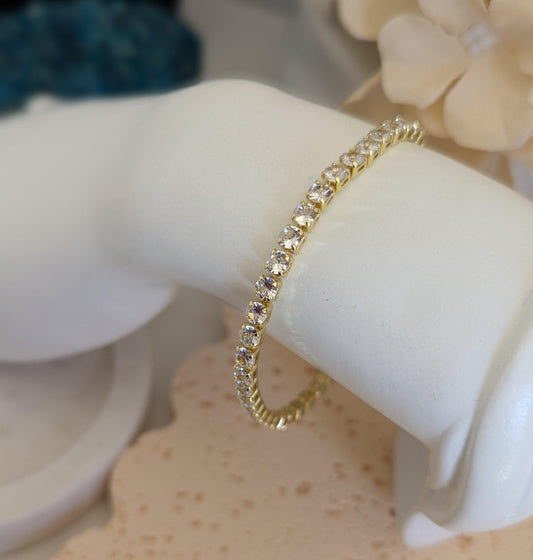Gold Tennis Bracelet on wrist for display