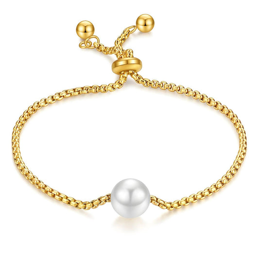 Gold-plated adjustable bracelet with a lustrous imitation pearl centrepiece. Features a delicate stainless steel chain with a sliding clasp for a secure and comfortable fit. Elegant, waterproof, and hypoallergenic design, perfect for everyday wear or special occasions.
